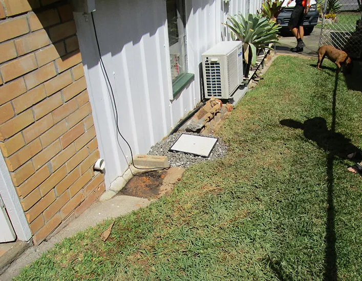 Completed installation showing clean finish alongside house